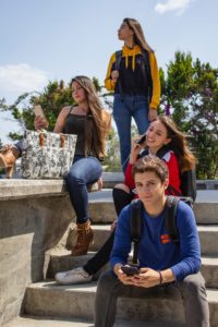 group-of-people-sitting-on-stairs-2124916